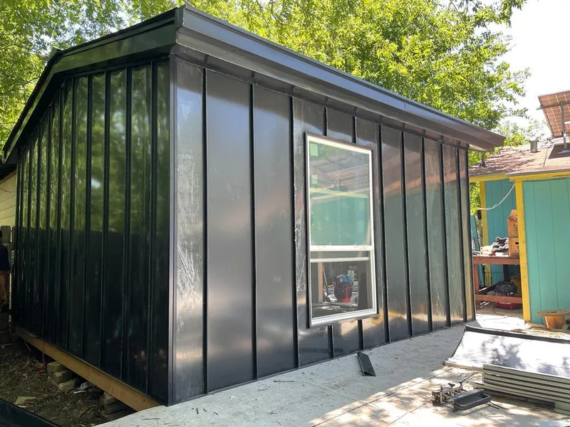 Black standing seam metal wall panels for Roof Inspection in Paris